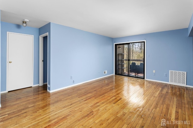 1724 Country Mill Dr, East Windsor, NJ 08512 - spare room with hardwood / wood-style flooring and baseboards