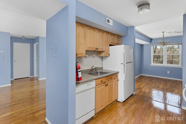 1724 Country Mill Dr, East Windsor, NJ 08512 - kitchen featuring white appliances, a sink, light wood-style floors, backsplash, and a chandelier