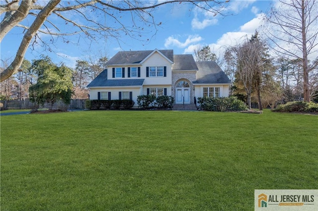 view of front of home with a front lawn