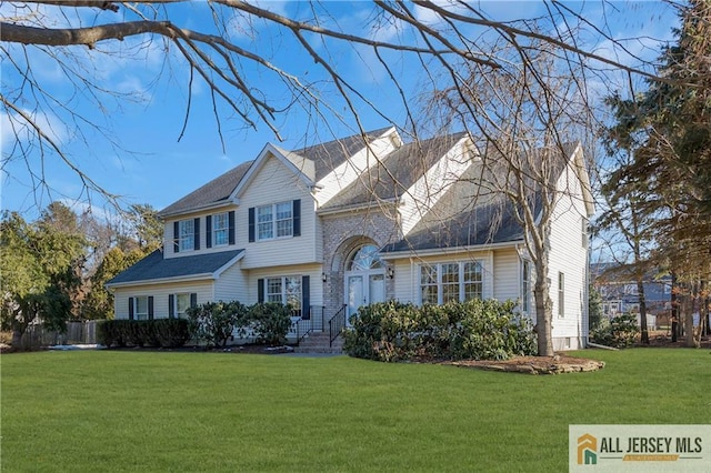 view of front of home featuring a front lawn