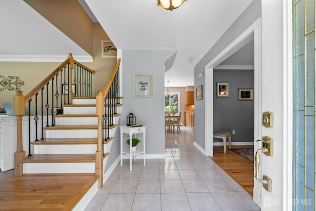 8 Garvey Dr, Monroe, NJ 08831 - entryway with stairs, tile patterned flooring, ornamental molding, and a chandelier