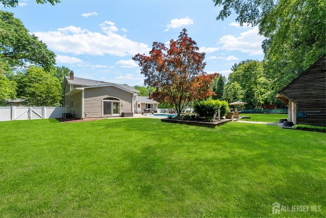 8 Garvey Dr, Monroe, NJ 08831 - fenced backyard featuring a gate
