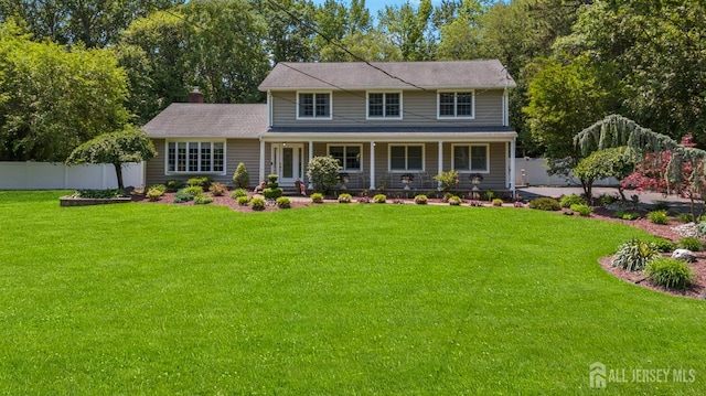 8 Garvey Dr, Monroe, NJ 08831 - view of front facade featuring a porch and a chimney