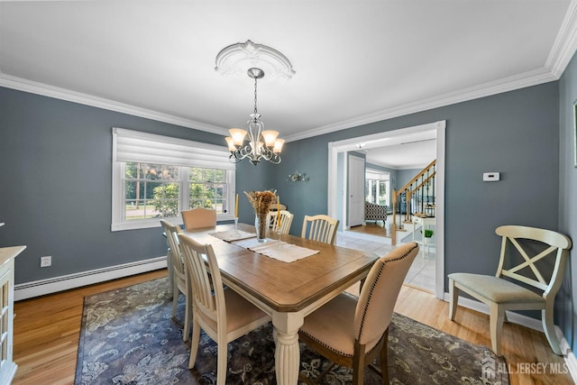 8 Garvey Dr, Monroe, NJ 08831 - dining area featuring a baseboard radiator, a chandelier, stairway, ornamental molding, and light wood-type flooring