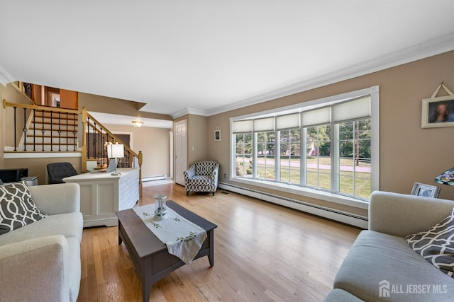 8 Garvey Dr, Monroe, NJ 08831 - living room with a baseboard heating unit, stairway, crown molding, and wood finished floors