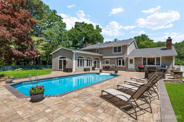 8 Garvey Dr, Monroe, NJ 08831 - view of pool with a patio area, an outbuilding, and a storage structure