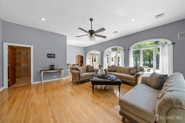 8 Garvey Dr, Monroe, NJ 08831 - living room with light wood finished floors, ceiling fan, recessed lighting, and arched walkways