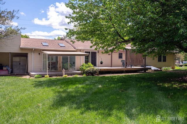 95 Half Acre Rd, Monroe, NJ 08831 - rear view of property featuring a deck, a yard, and roof with shingles