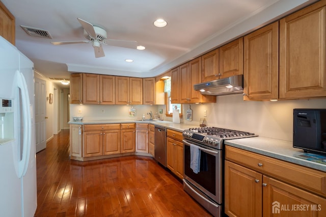 95 Half Acre Rd, Monroe, NJ 08831 - kitchen with stainless steel appliances, under cabinet range hood, a sink, dark wood-style flooring, and a ceiling fan