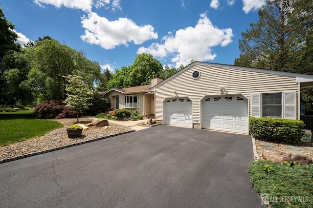 95 Half Acre Rd, Monroe, NJ 08831 - ranch-style home featuring an attached garage, driveway, and a chimney