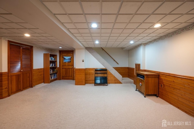 95 Half Acre Rd, Monroe, NJ 08831 - finished below grade area with a wainscoted wall, wooden walls, light carpet, recessed lighting, and a paneled ceiling