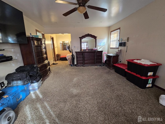 bedroom featuring a ceiling fan and carpet floors