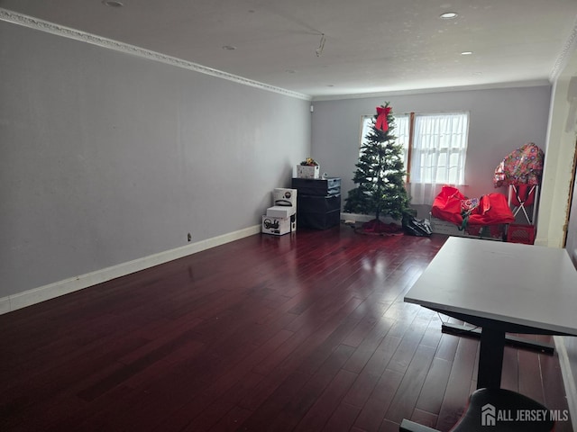 interior space with crown molding, baseboards, and dark wood-type flooring