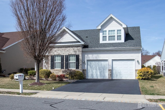 53 Mandrake Rd, Monroe, NJ 08831 - traditional-style home featuring asphalt driveway, a shingled roof, and a front yard