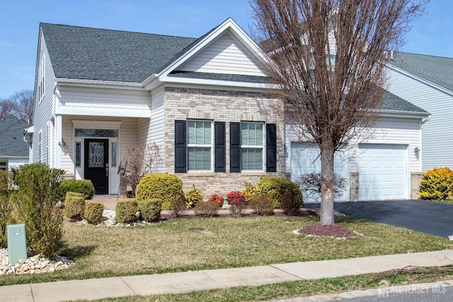 53 Mandrake Rd, Monroe, NJ 08831 - view of front of house with a garage, a shingled roof, a front lawn, and driveway
