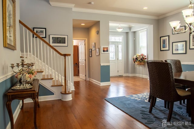 53 Mandrake Rd, Monroe, NJ 08831 - dining space with stairway, wood finished floors, crown molding, a chandelier, and recessed lighting