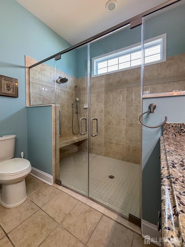 53 Mandrake Rd, Monroe, NJ 08831 - full bath with plenty of natural light, a stall shower, toilet, and tile patterned flooring