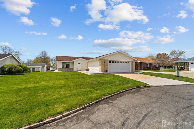 214 Branch Rd, Monroe, NJ 08831 - ranch-style house with a garage, a front yard, driveway, and brick siding