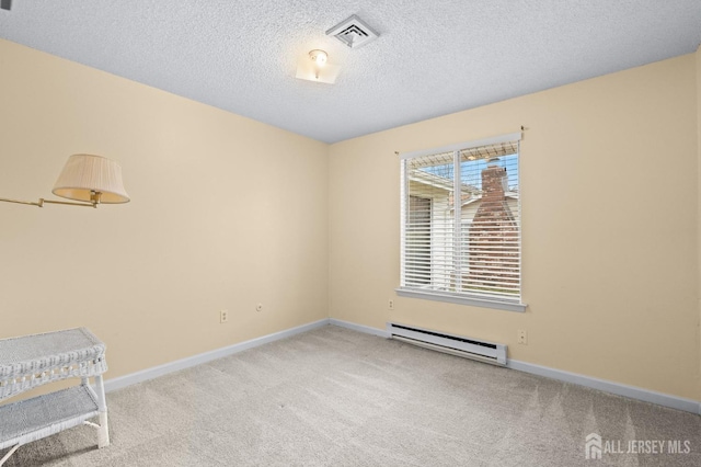 214 Branch Rd, Monroe, NJ 08831 - empty room with a baseboard radiator, carpet floors, a textured ceiling, and baseboards