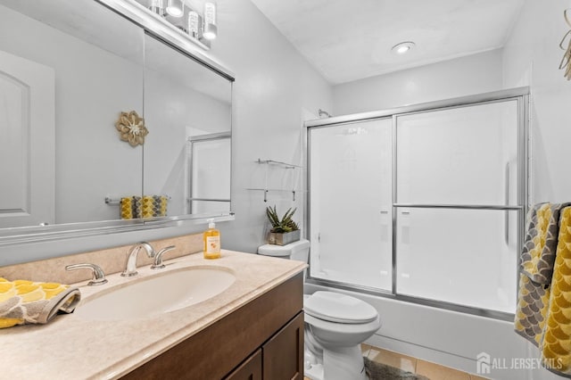 214 Branch Rd, Monroe, NJ 08831 - bathroom featuring vanity, shower / bath combination with glass door, and toilet