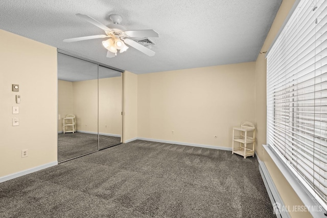 214 Branch Rd, Monroe, NJ 08831 - unfurnished bedroom with carpet floors, a textured ceiling, a closet, ceiling fan, and baseboards