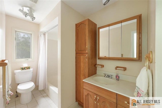 full bathroom with vanity, toilet, shower / bath combo, and tile patterned floors