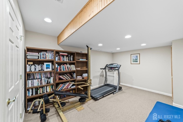 workout room featuring carpet, baseboards, and recessed lighting