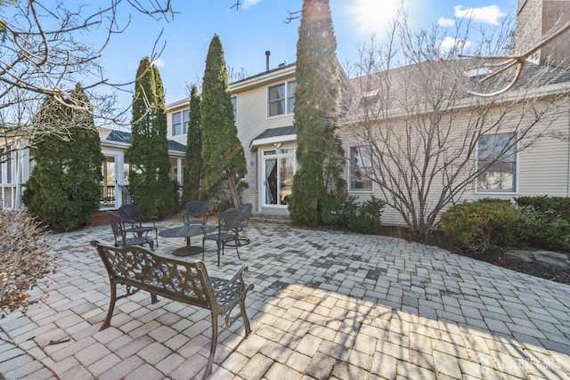 rear view of property with a patio area