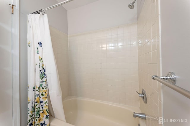 full bath featuring shower / bath combination with curtain