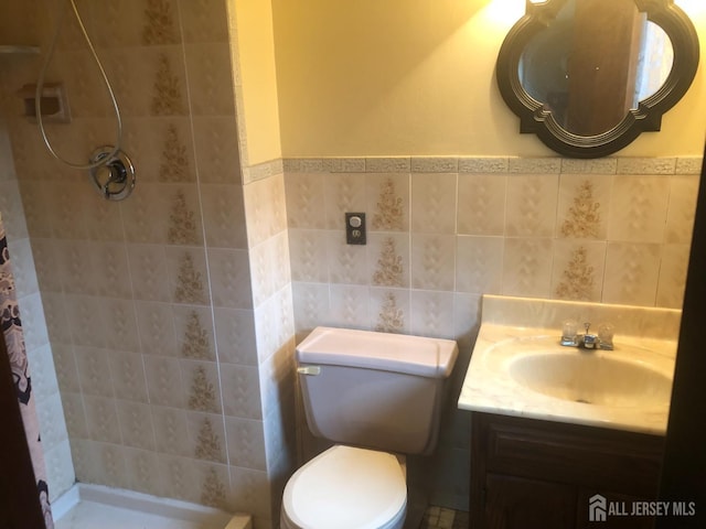 41 Bartha Ave, Edison, NJ 08817 - bathroom with tile walls, a stall shower, vanity, and toilet