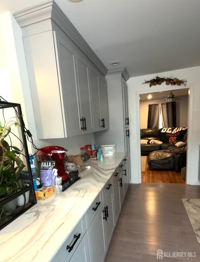 150 School St, Piscataway, NJ 08878 - kitchen with light wood-style floors and light stone counters
