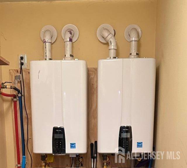 150 School St, Piscataway, NJ 08878 - utility room featuring water heater