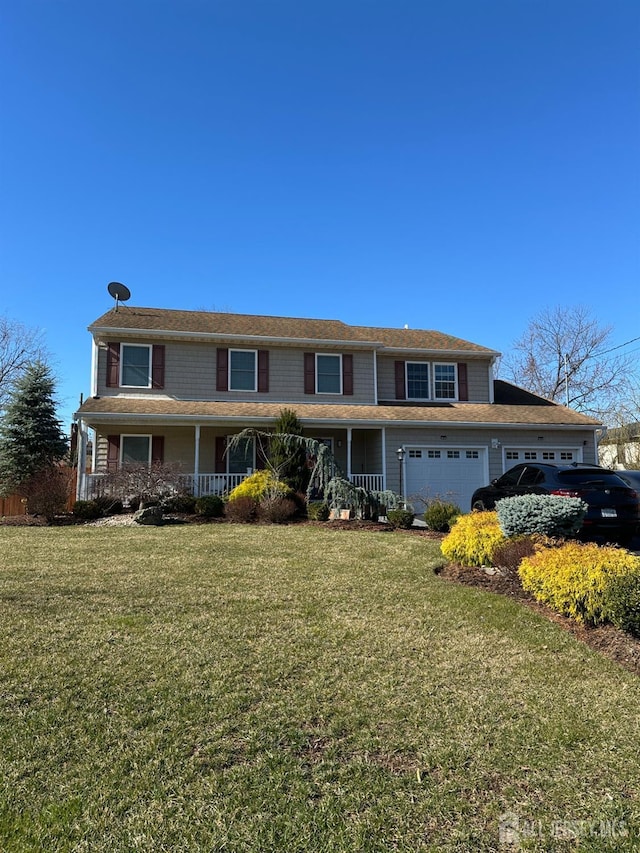 150 School St, Piscataway, NJ 08878 - view of front of house featuring a porch, a front yard, and a garage