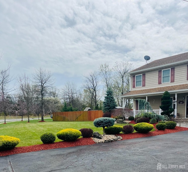150 School St, Piscataway, NJ 08878 - view of side of home with a porch
