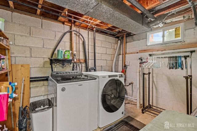 washroom with laundry area and separate washer and dryer