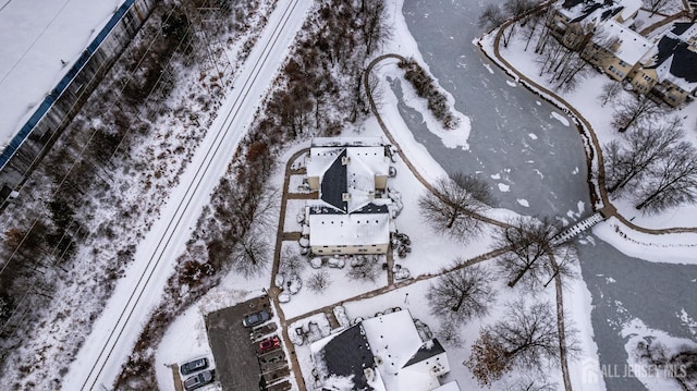 snowy aerial view featuring a residential view