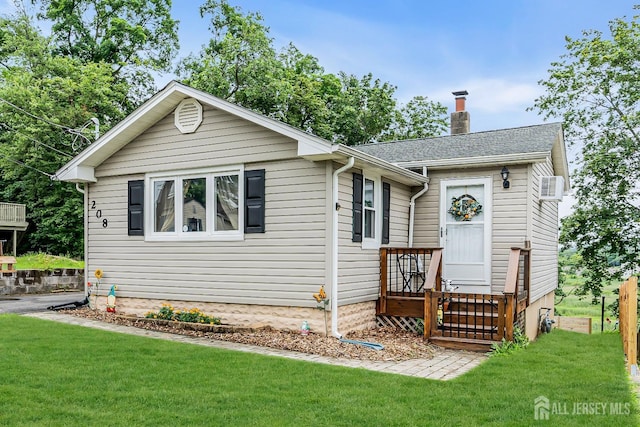 208 Hilltop Blvd, Old Bridge, NJ 07735 - view of front of house featuring a front lawn and a chimney
