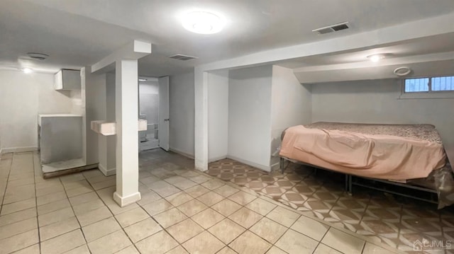 264 Seaman St, New Brunswick, NJ 08901 - below grade area with baseboards and light tile patterned floors