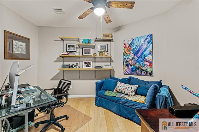 home office featuring ceiling fan and wood finished floors