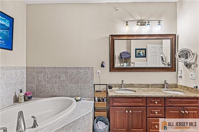 full bath with a garden tub and double vanity