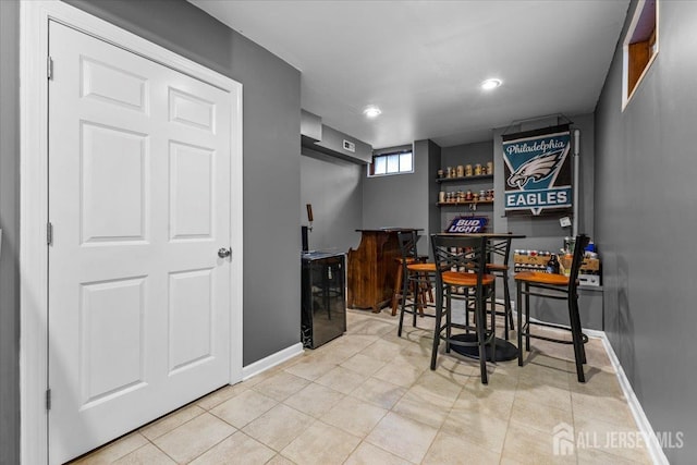 295 Gemini Dr Unit 3D, Hillsborough, NJ 08844 - indoor dry bar featuring baseboards, wine cooler, recessed lighting, and tile patterned flooring