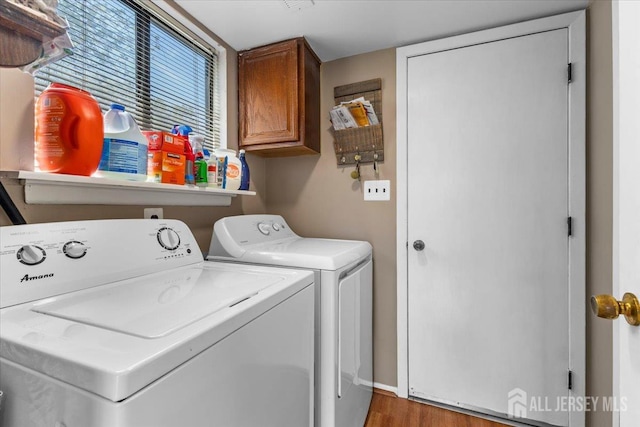 295 Gemini Dr Unit 3D, Hillsborough, NJ 08844 - laundry area featuring separate washer and dryer, cabinet space, and wood finished floors
