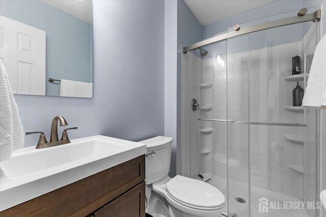 295 Gemini Dr Unit 3D, Hillsborough, NJ 08844 - full bath with toilet, a stall shower, and vanity