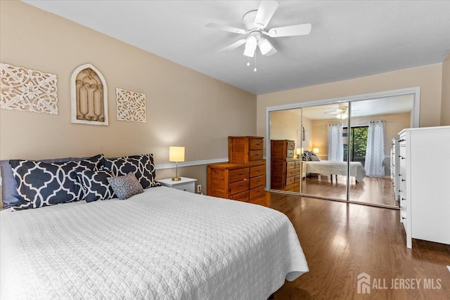 295 Gemini Dr Unit 3D, Hillsborough, NJ 08844 - bedroom featuring wood finished floors, a closet, and a ceiling fan