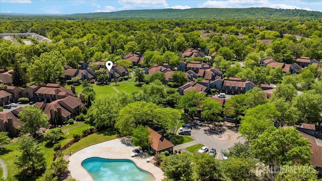 295 Gemini Dr Unit 3D, Hillsborough, NJ 08844 - aerial view of residential area featuring a forest and a pool area
