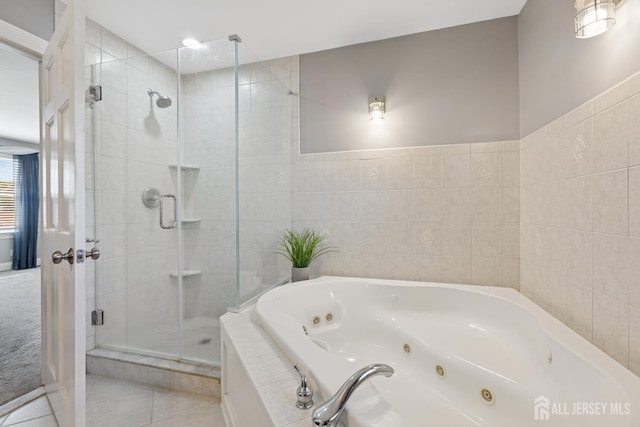 3223 Banta Rd, South Plainfield, NJ 07080 - bathroom with a shower stall, tile walls, a jetted tub, and tile patterned flooring