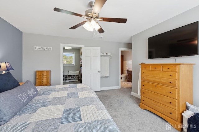 3223 Banta Rd, South Plainfield, NJ 07080 - bedroom with ensuite bath, carpet flooring, baseboards, and a ceiling fan