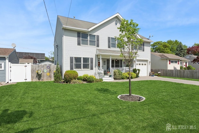 3223 Banta Rd, South Plainfield, NJ 07080 - traditional-style home with a gate, covered porch, driveway, and an attached garage