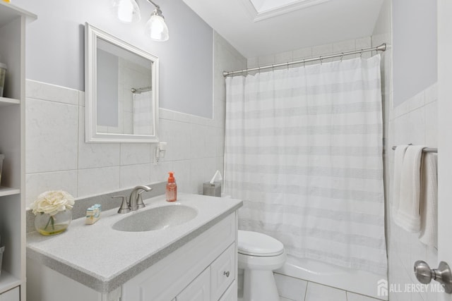 3223 Banta Rd, South Plainfield, NJ 07080 - bathroom with tile walls, toilet, and vanity
