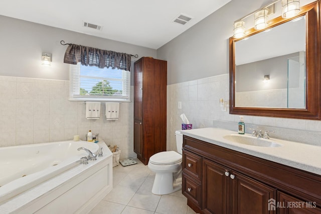 3223 Banta Rd, South Plainfield, NJ 07080 - full bathroom with tile walls, tile patterned flooring, a whirlpool tub, vanity, and toilet